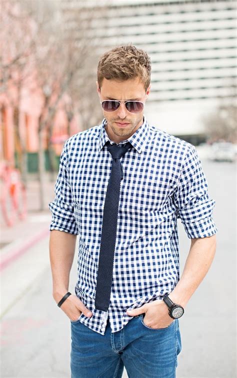 man wearing shirt and tie.